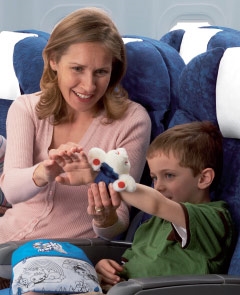 Mother and son playing with a toy.