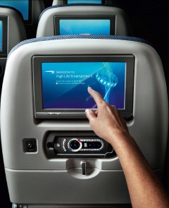 Touchscreen in the back of the seat.