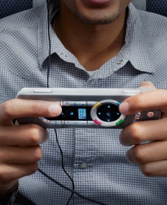 Man playing with a games console.