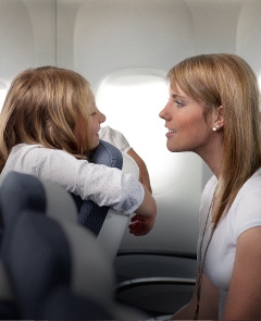 Girl looking over the seat.